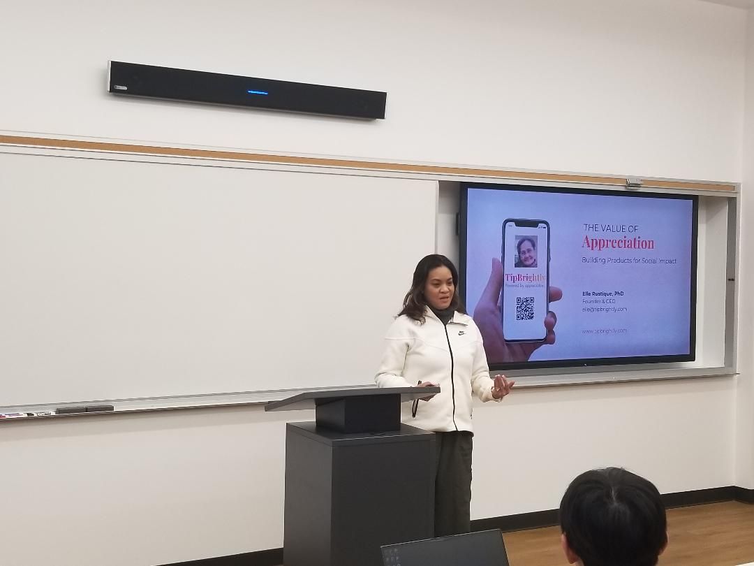TipBrightly CEO Elle Rustique discusses her startup to San Francisco Bay University students.