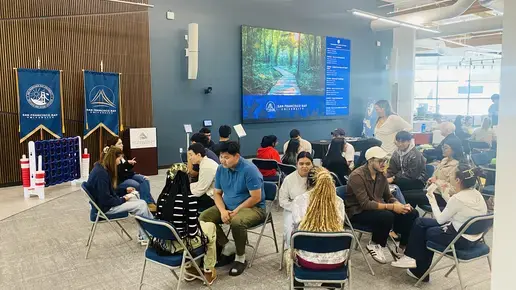 SFBU students painting together during Digital Detox Day in the Learning Resource Center