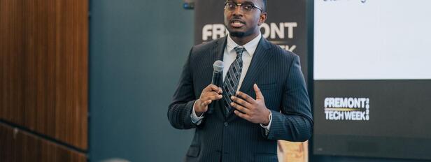 SFBU Startup Scholar Malik Harouna presents at Fremont Tech Week 2026.