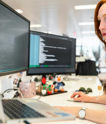 Woman Coding on Computer