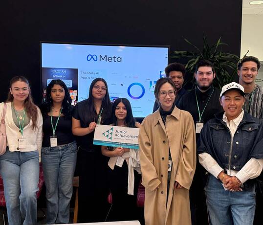 Startup scholars in a group smiling for a picture