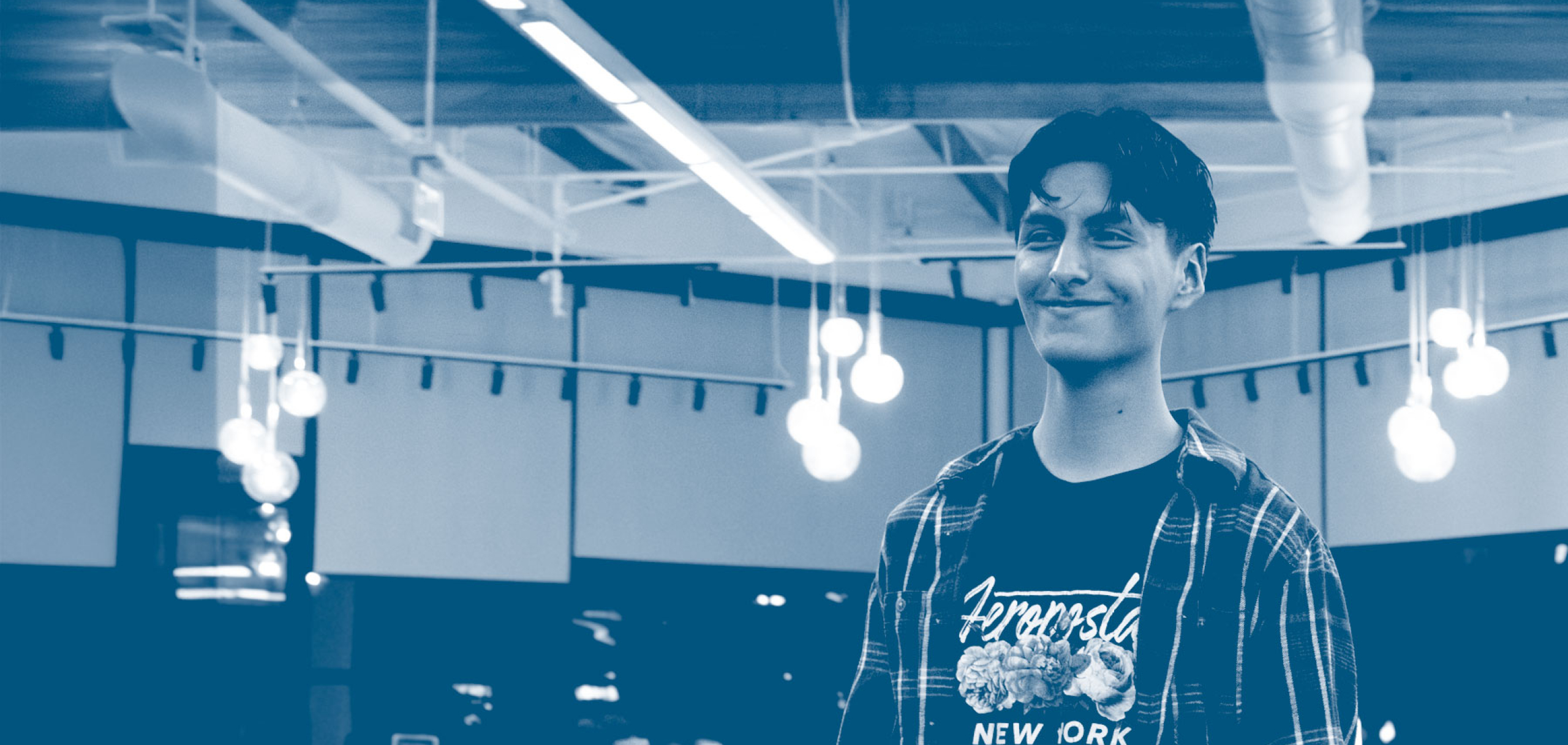 Happy male student smiling 