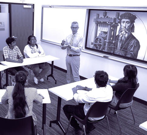 Teacher in front of lecture hall