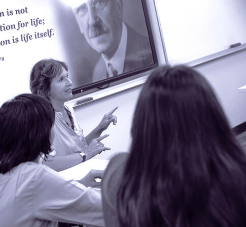 Teacher instructing students 