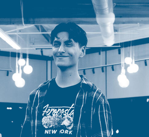 Happy male student smiling 