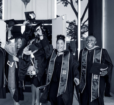 SFBU grads celebrating at graduation