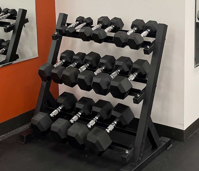 Dumbell weights on a rack