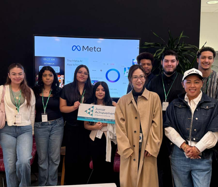 Startup scholars in a group smiling for a picture