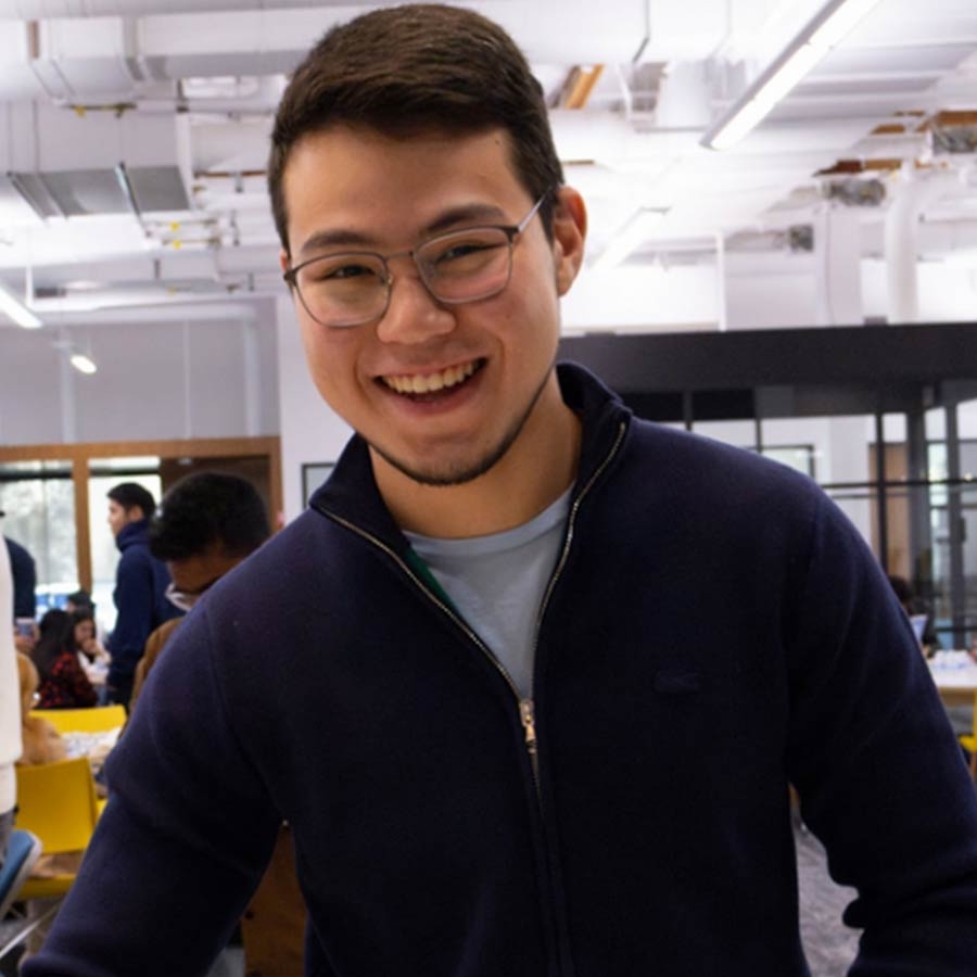 Happy male student smiling