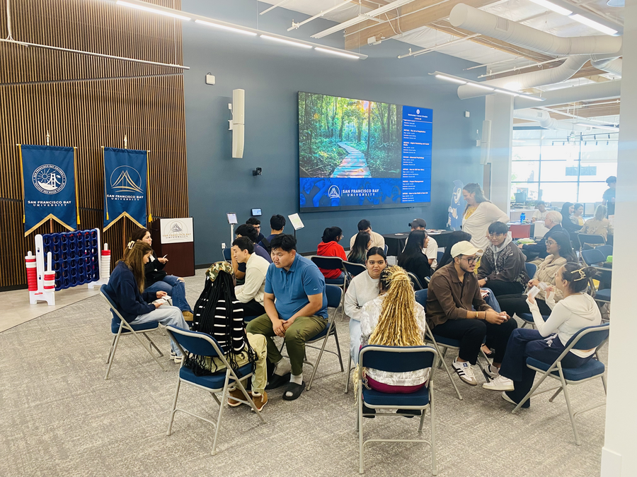 SFBU students painting together during Digital Detox Day in the Learning Resource Center